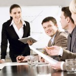 Portrait of business people discussing a new strategy at a seminar